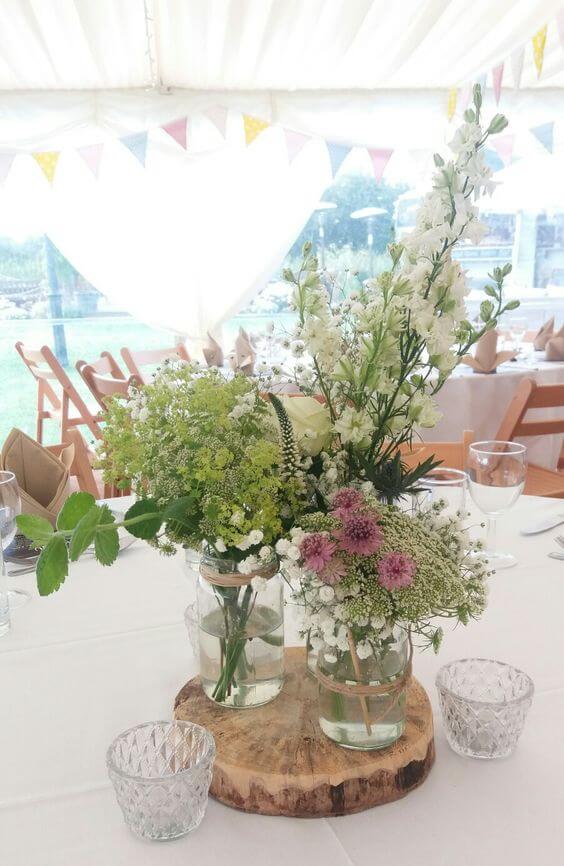 Rustic marquee table flowers